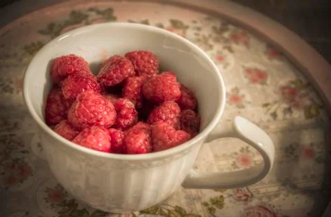 A Cup of Raspberries Stock Photos