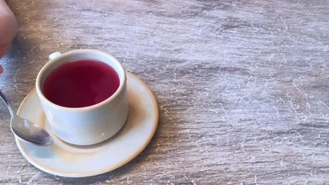 Cup of red tea with spoon 库存影片 332586351
