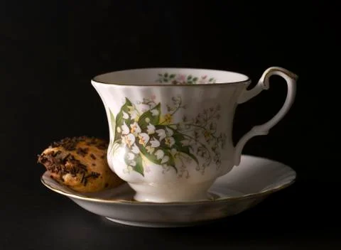 Cup with a roll Stock Photos