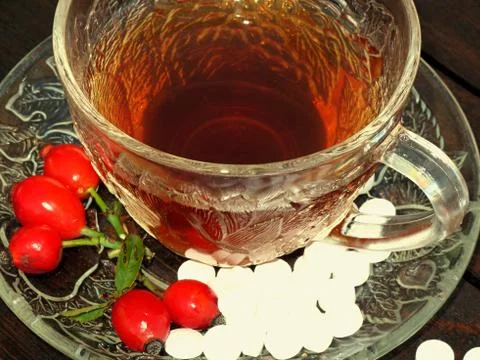 A cup of rosehip tea Stock Photos
