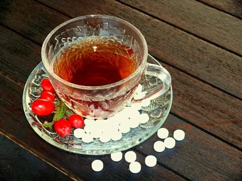 A cup of rosehip tea Stock Photos