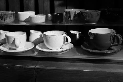 A cup saucers tree box kitchen black and white retro kitchen tools Stock Photos