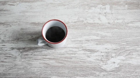 Cup of steaming or steamy black coffee Stock Footage 126726257