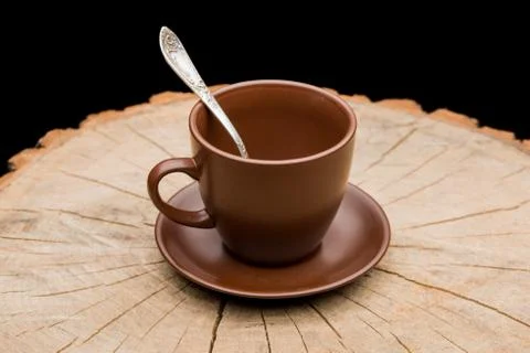 Cup on a stump Stock Photos