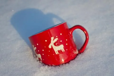 Cup is on the table in winter landscape Stock Photos