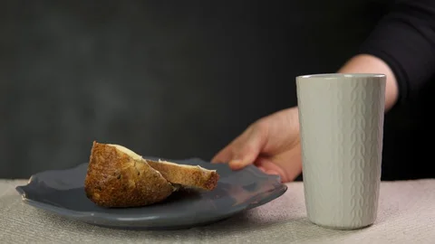 A cup of tea and bread with butter Stock-Footage 130116264