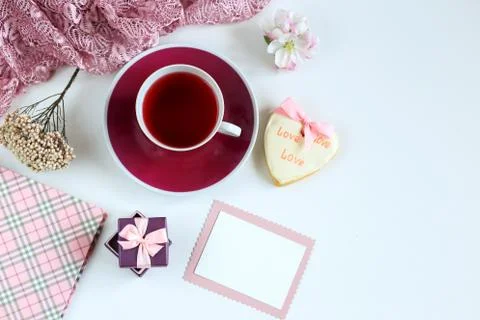A cup of tea and a gingerbread Stock Photos