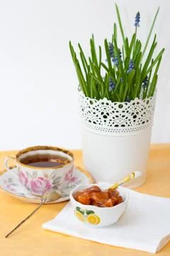 A cup of tea and jam Stock Photos