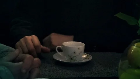 A cup of tea and a man's hand Vídeo Stock 88324628