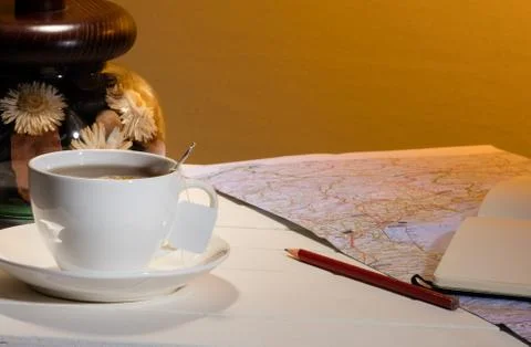 Cup of tea and map Stock Photos