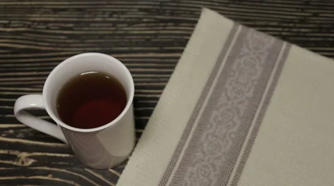 A cup of tea and pastry Stock Footage 63090120