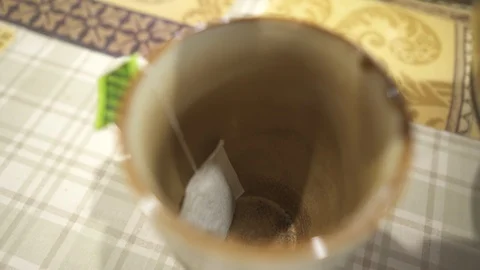 Cup of tea being poured and the steam accumulating. Stock Footage