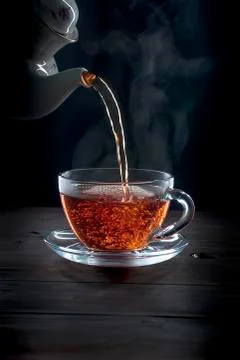 Cup of tea on black background Stockfoto's