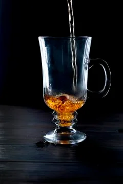 Cup of tea on black background Stock Photos