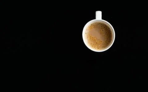 A cup of tea on a black background Foto stock