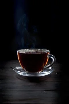 Cup of tea on black background Stock Photos