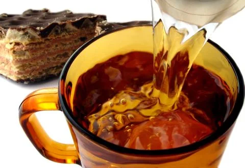 A Cup of tea with cake Stock Photos