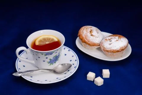 Cup of tea with cake Stock Photos
