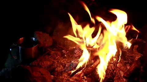 Cup of tea at campfire Video stock 54807922