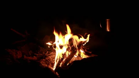 Cup of tea at campfire Stockbeeldmateriaal 54808034