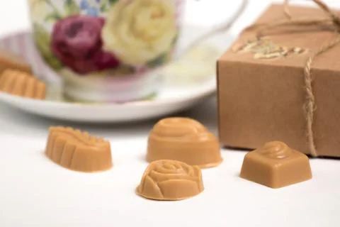 Cup of tea with candies Stock Photos