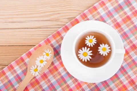 Cup of tea with chamomile. Stock Photos