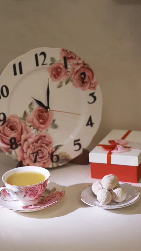 Cup of tea close-up. Decorated christmas clock on background Stock Footage 224895845