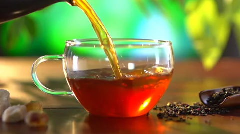 Cup of Tea Closeup over Nature Green Background Stock Footage 33962149
