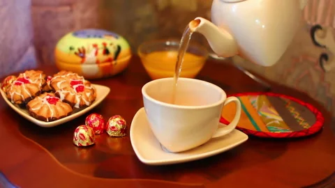 A Cup Of Tea with cookies and candy Stock Footage 234809051