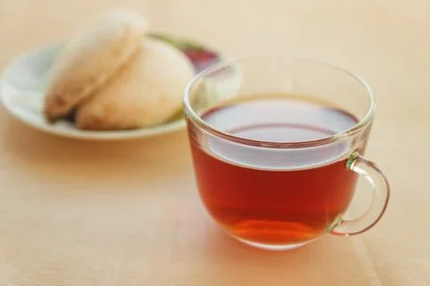 Cup of tea with cookies on table close-up Stock Photos