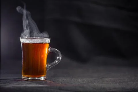 The Cup of tea on a dark background Фото