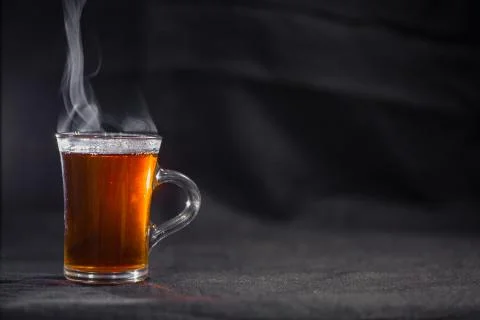 The Cup of tea on a dark background Photos