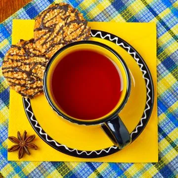 Cup of tea with dessert served. Stock Photos