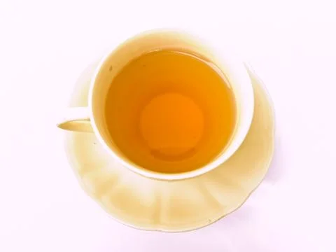 A cup of tea with floral pattern isolated on white background Stock Photos