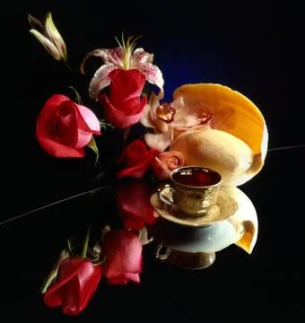Cup of tea with flowers Stock Photos