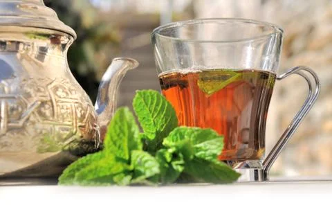 Cup of tea in garden Stock Photos