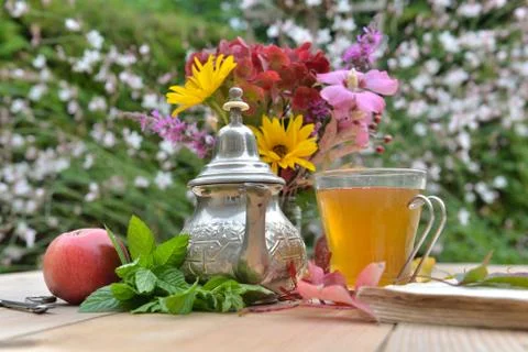 Cup of tea in garden Stock Photos