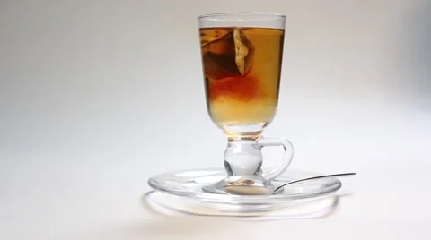 A cup of tea in a glass cup Stock Footage 47176029