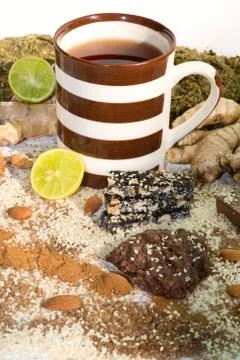 Cup of tea with ingredients for tea Stock Photos
