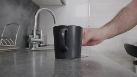 Cup tea kitchen man pick easy Stock Footage 340875984