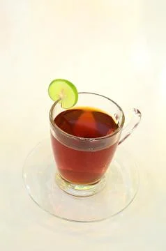 Cup of tea with lemon Stock Photos