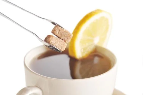 Cup of tea with lemon Stock Photos