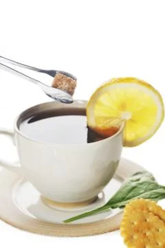 Cup of tea with lemon Stock Photos