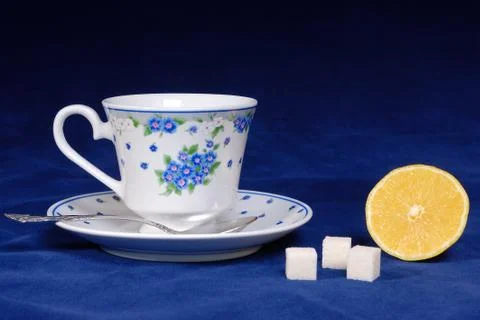 Cup of tea with lemon Stock Photos