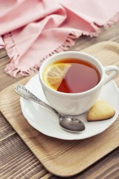 Cup of tea with lemon Stock Photos