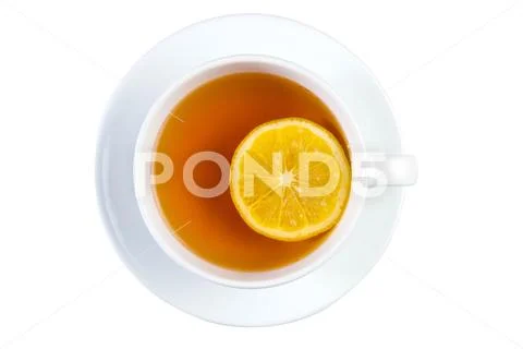 Cup of tea with lemon on a saucer top view isolated on white background Stock Photos