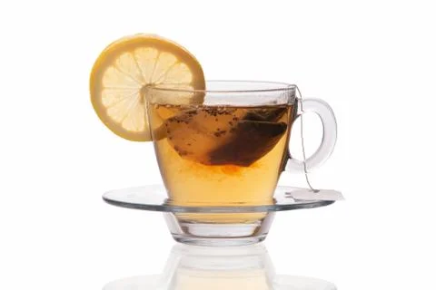 Cup of tea with lemon slice isolated on white background Stock Photos