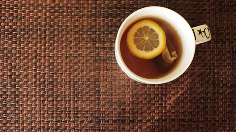Cup of tea with lemon time-lapse Video stock 125088280