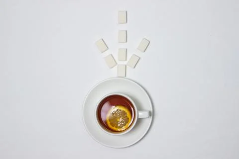 A cup of tea with lemon on a white background Stock Photos