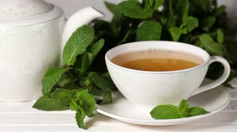 Cup of tea with mint and sugar Video stock 56026912